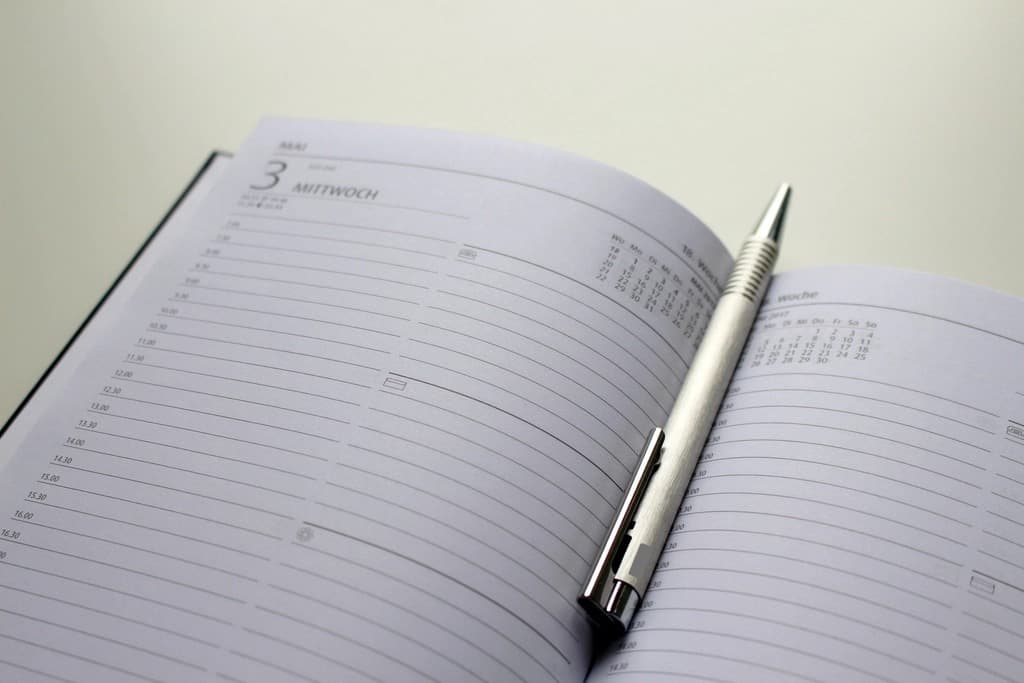 A monthly wall calendar with several dates circled in ink.